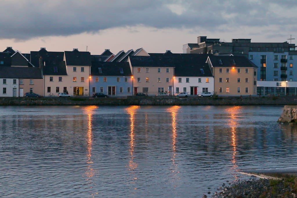 The Long Walk houses on the River Corrib at dusk, Galway