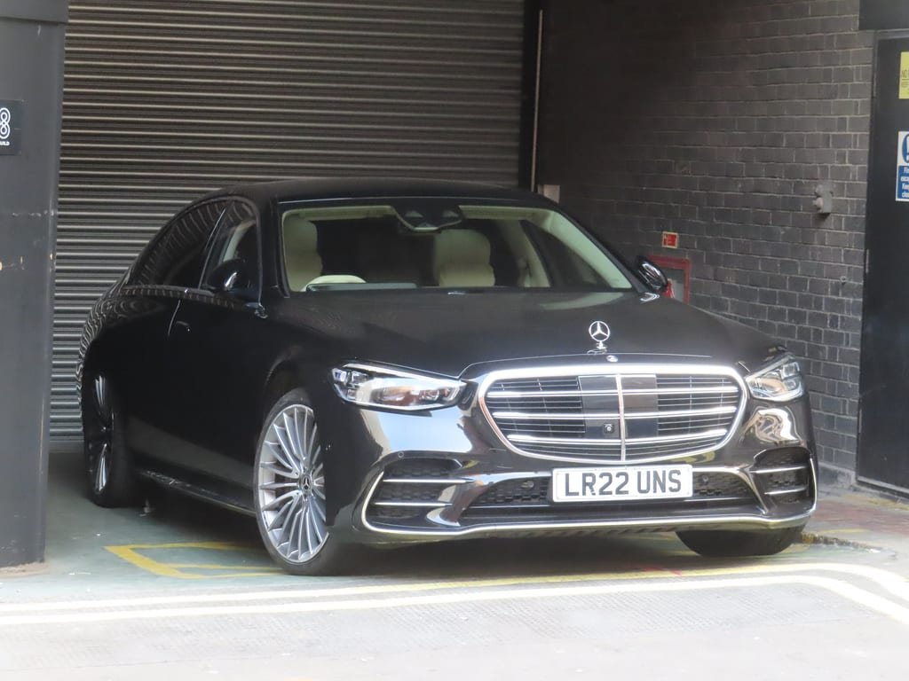 Black Mercedes-Benz S-Class parked on a Mayfair street